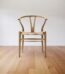 The CH24 Wishbone Chair is more than just a piece of furniture—it is a testament to the art of fine craftsmanship and timeless design. Inspired by the harmony of Scandinavian aesthetics and Japanese minimalism, this chair embodies sophistication, durability, and comfort in its purest form. Every curve and joint is meticulously crafted to create an inviting seating experience that seamlessly blends into both contemporary and classic interiors.