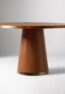 ALDERA solid teak round dining table handcrafted in Jepara with a sculptural pedestal base.