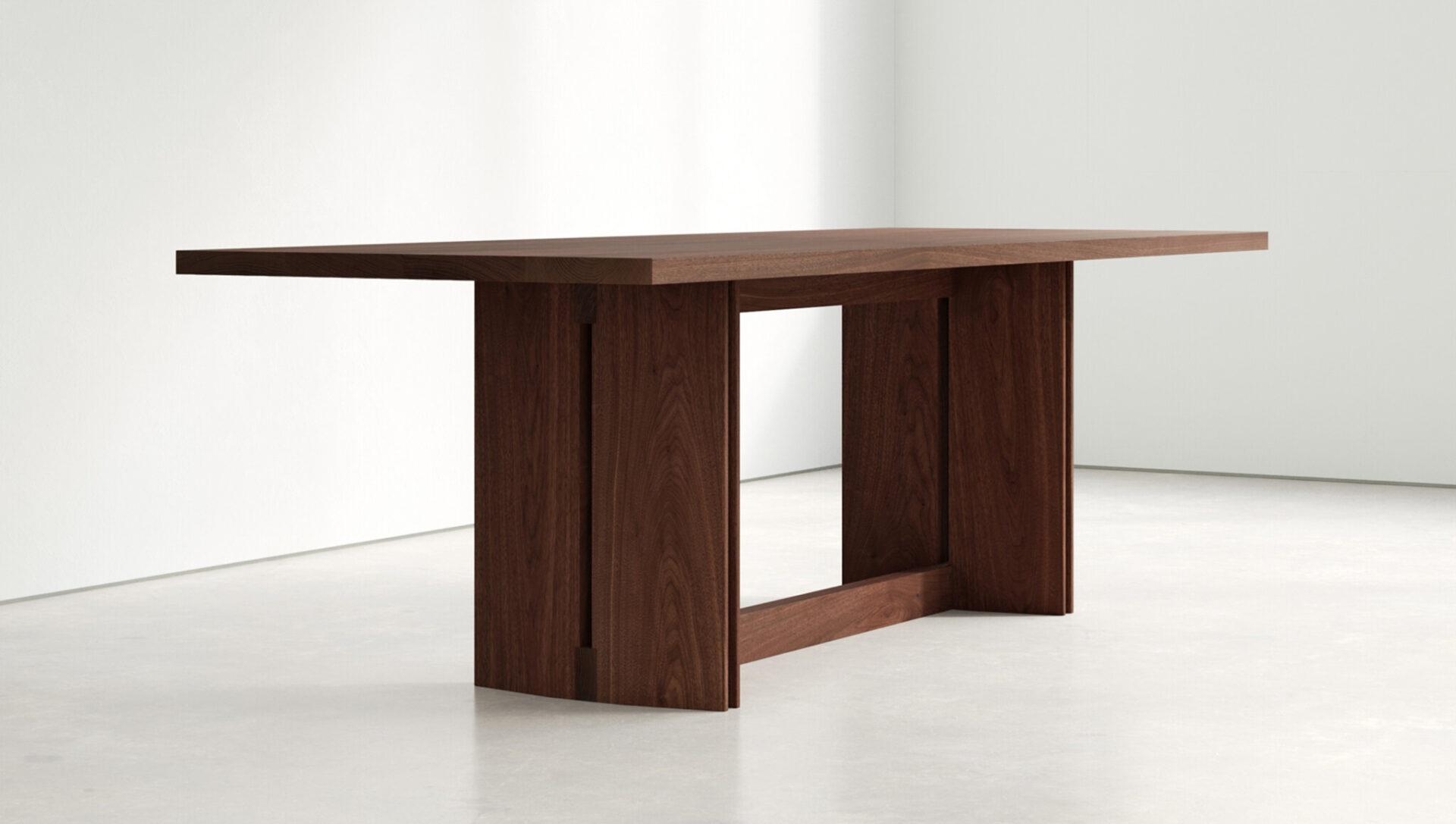 Close-up detail of the tapered tabletop and teak wood grain on the AUREN Dining Table.